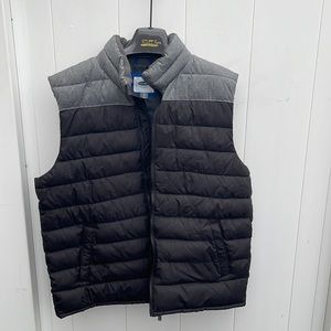 Warm vest for work or play. Barely worn . My son does not like vests😊.